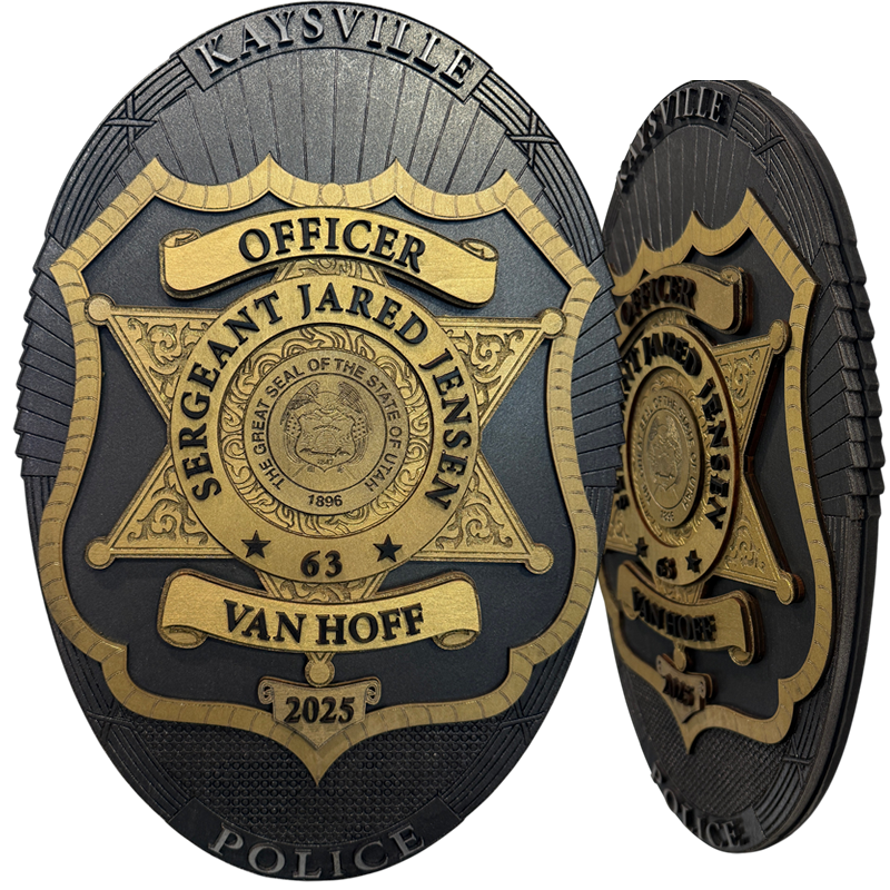 Custom award in the shape of a 12" tall badge